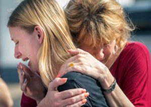 school safety - Santa Fe High School student Dakota Shrader is comforted by her mother Susan Davidson following a shooting at the school on Friday, May 18, 2018, in Santa Fe, Texas. Shrader said her friend was shot in the incident. 