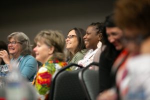A group of women watching a presentation during the 2019 Robert Lee Sutherland Seminar