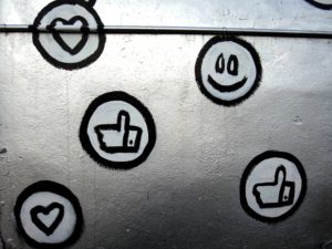 Photo of wall graffiti of emojis