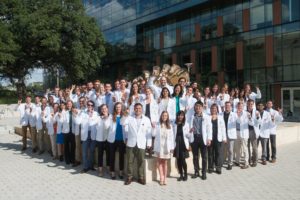 A photo of the first Dell Medical School graduating class
