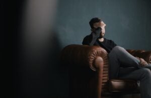 Stock photo of stressed man for allostatic load blog