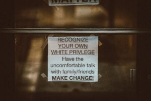 Photo of a white privilege sign