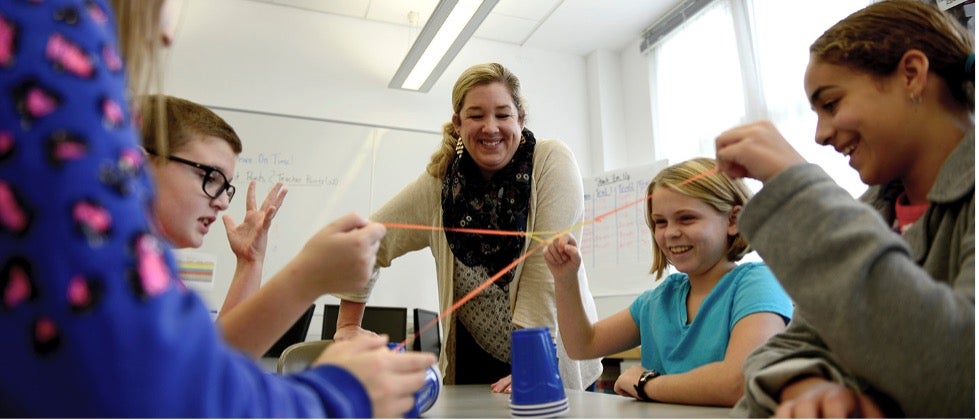 teacher and kids in classroom