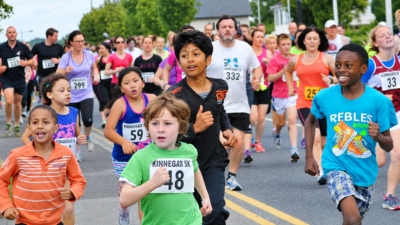 Access to sports - Kids happily running a race
